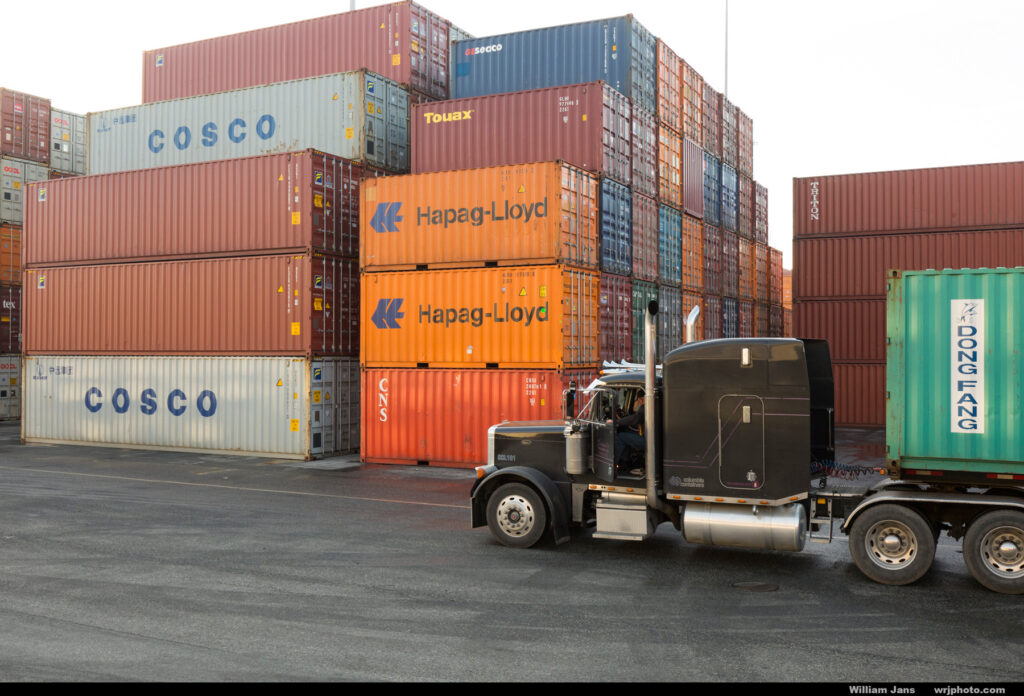 Picture of containers and a truck at the Port of Vancouver
