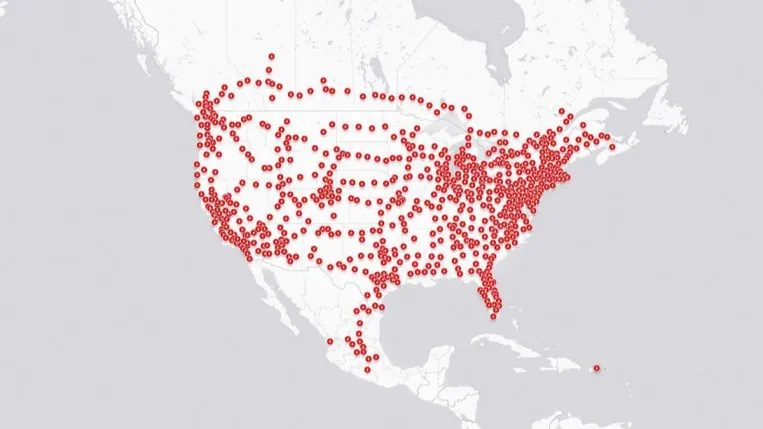 A map of the 48 contiguous United States showing hundreds of Tesla Supercharger locations.