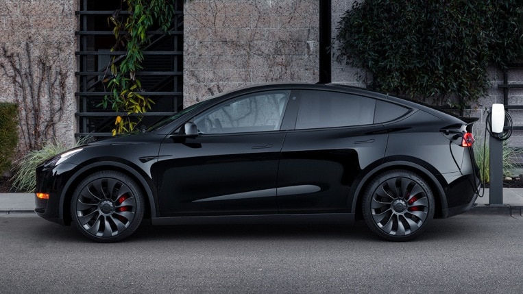 2022 Tesla Model Y in black, charging.