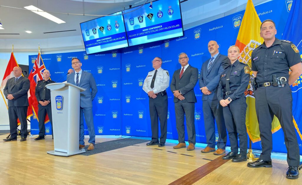 Police officers standing during a press conference
