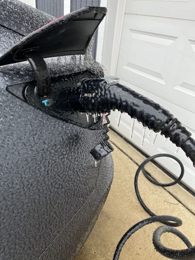 ice covering charge port on tesla model 3