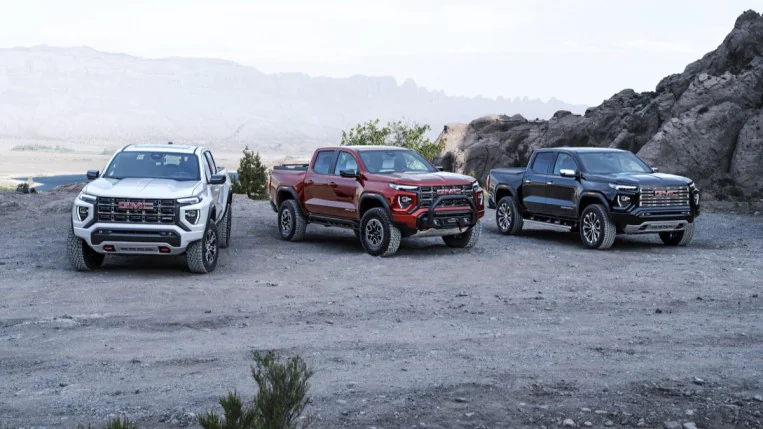 The 2023 GMC Canyon in three flavors -- Elevation, AT4, and Denali.